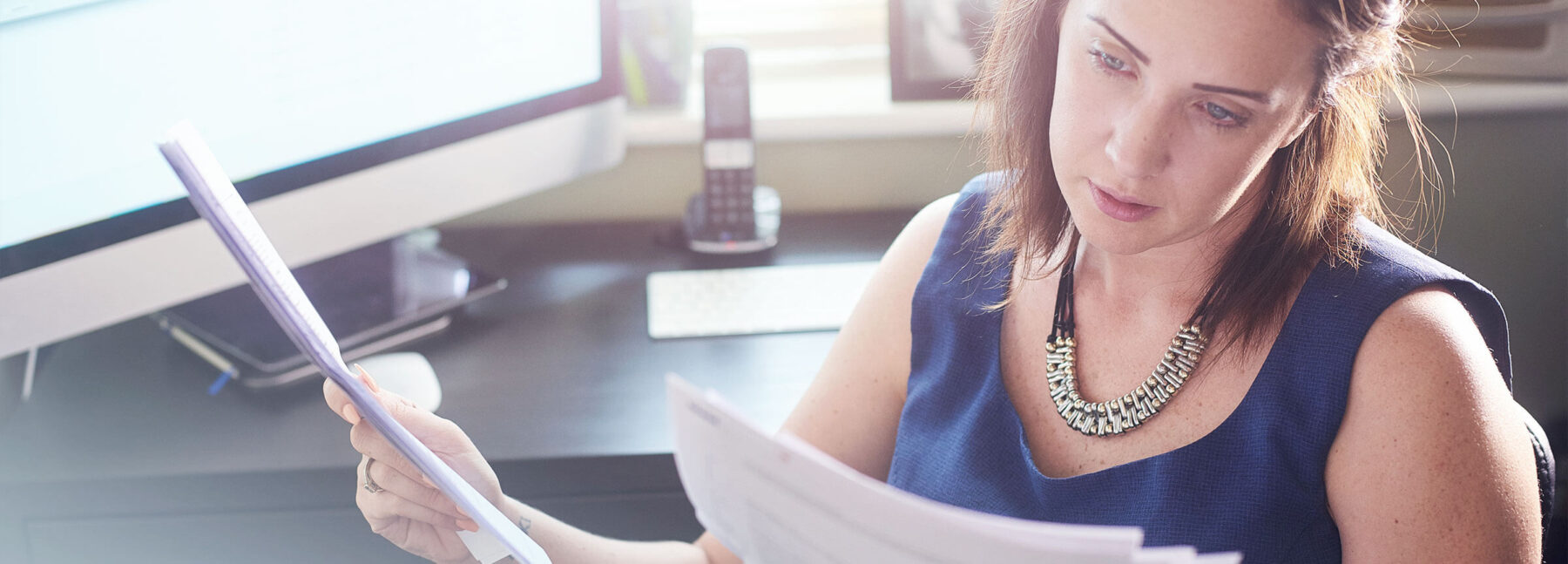 women looking through paperwork