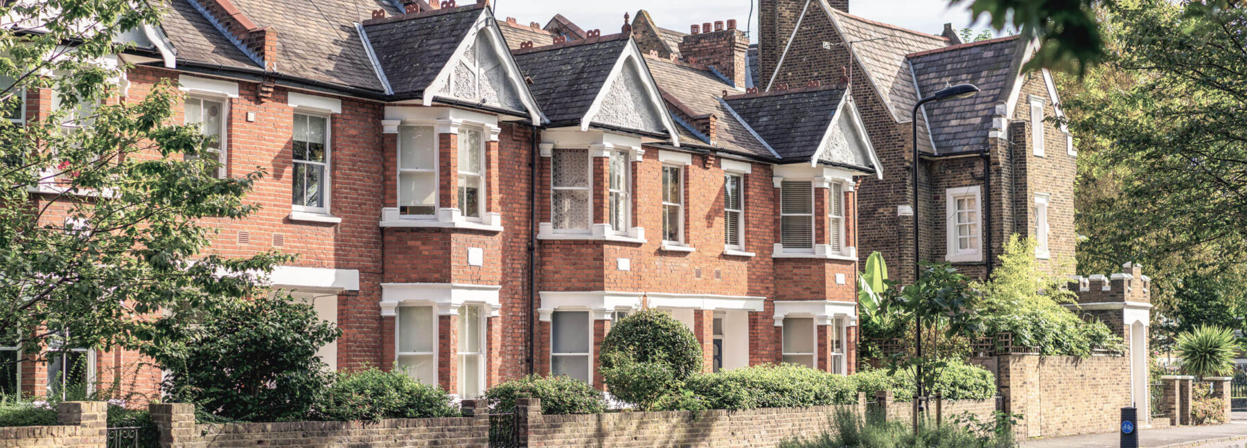 group of terraced red brick houses