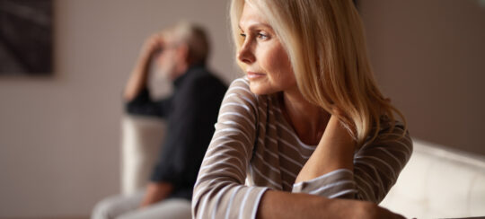 Senior woman in conflict with husband