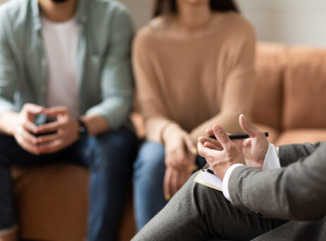 cohabiting couple talking to a lawyer