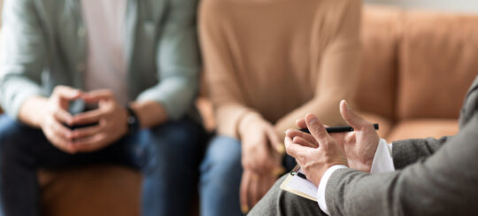 cohabiting couple talking to a lawyer